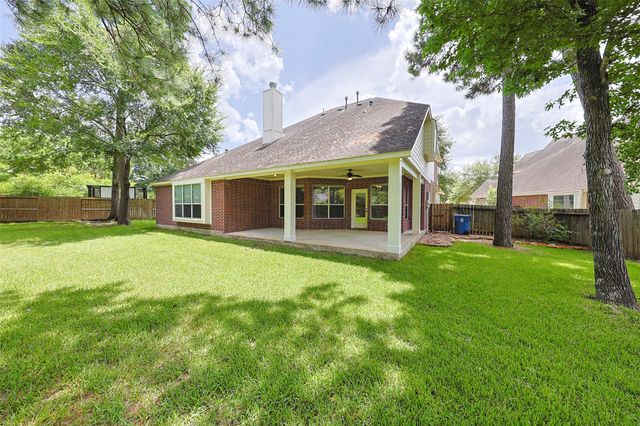 403 Woodpecker Forest Lane, Conroe, TX 77384