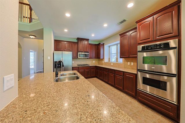 403 Woodpecker Forest Lane, Conroe, TX 77384