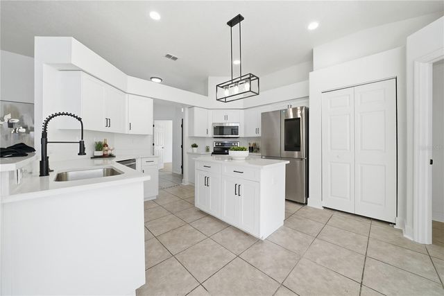 1407 WATERMILL CIRCLE, Tarpon Springs, FL 34689