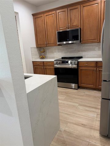 1413 PORTOFINO MEADOWS BOULEVARD, Orlando, FL 32824