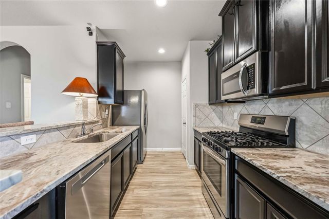 6510 Macroom Meadows Lane, Houston, TX 77048