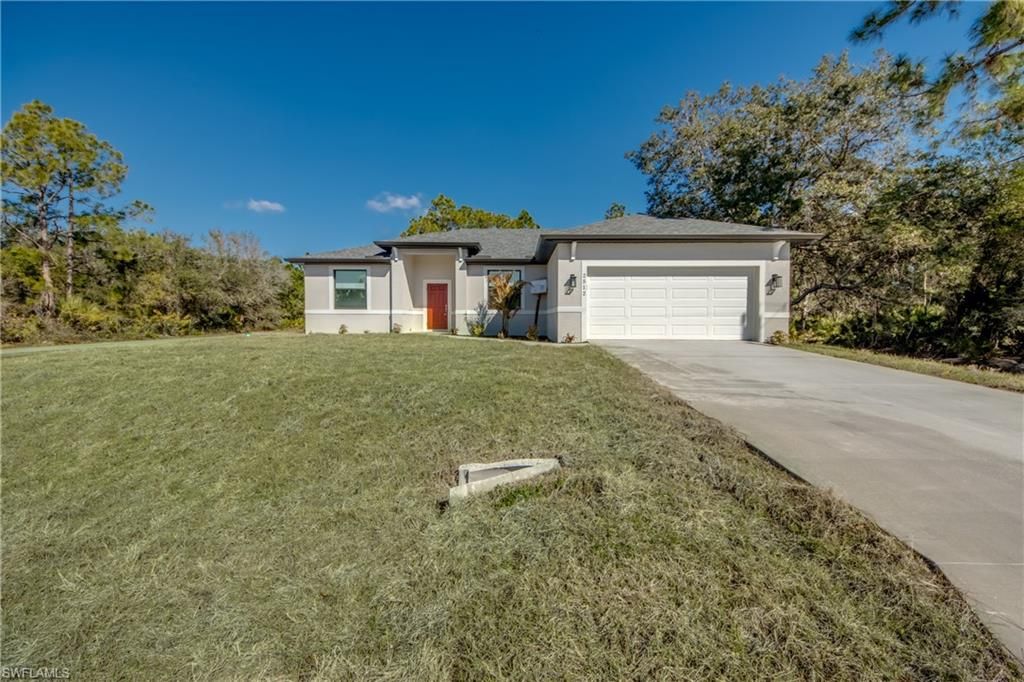 2512 48th ST W, LEHIGH ACRES, FL 33971 — exterior