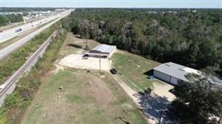 26597 E River Road, Splendora, TX 77372