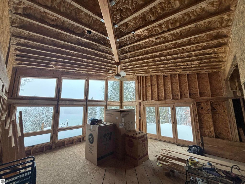 Image 15 of property listing at 7681 NW Torch Lake Drive, Kewadin, MI 49648