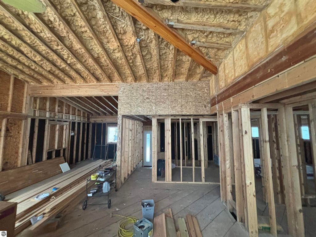 Image 19 of property listing at 7681 NW Torch Lake Drive, Kewadin, MI 49648