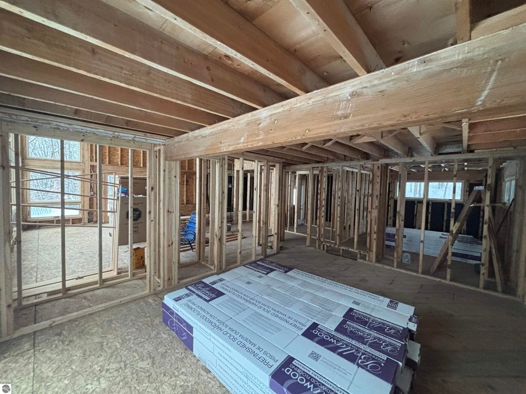 Image 22 of property listing at 7681 NW Torch Lake Drive, Kewadin, MI 49648