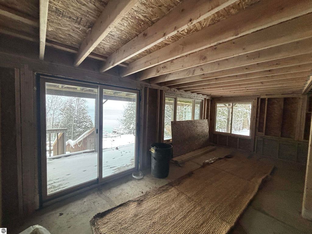 Image 23 of property listing at 7681 NW Torch Lake Drive, Kewadin, MI 49648