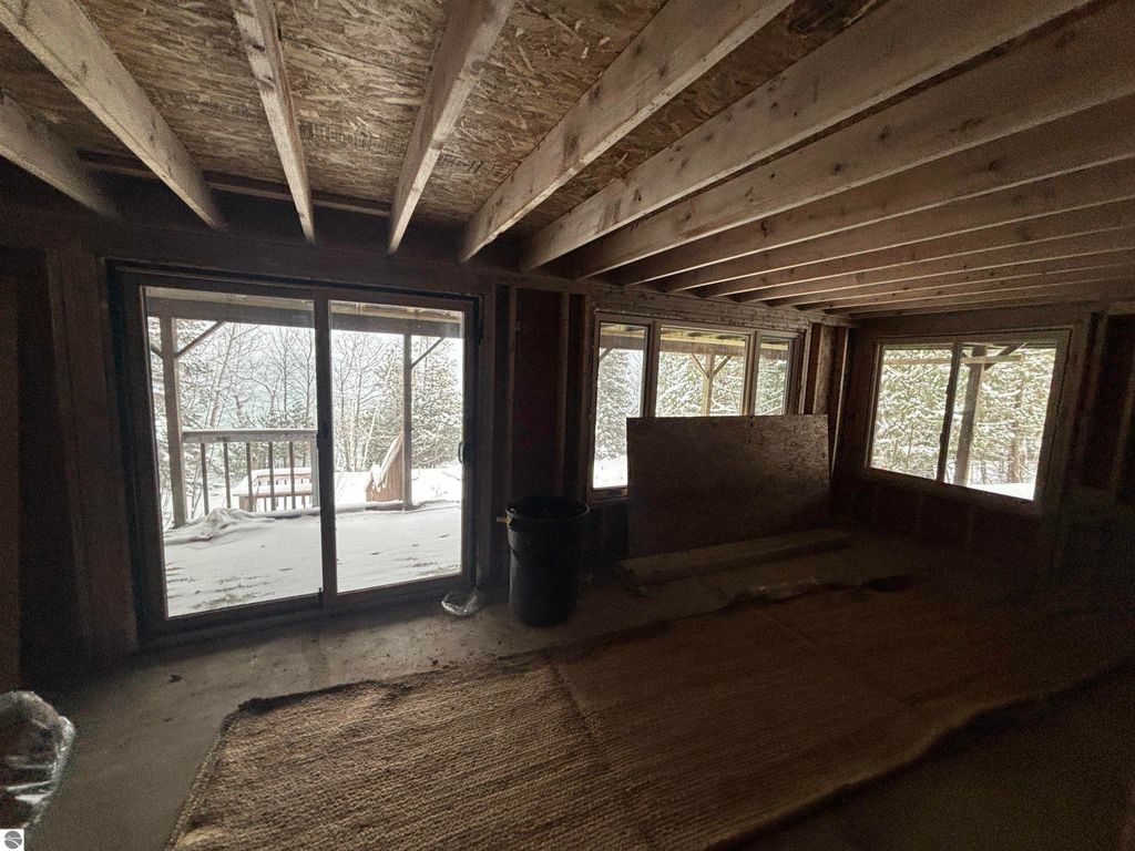 Image 24 of property listing at 7681 NW Torch Lake Drive, Kewadin, MI 49648