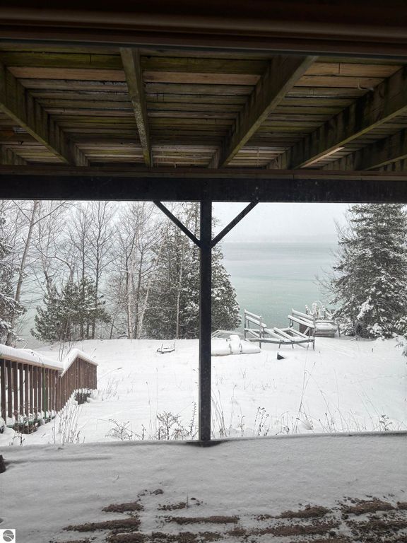 Image 25 of property listing at 7681 NW Torch Lake Drive, Kewadin, MI 49648