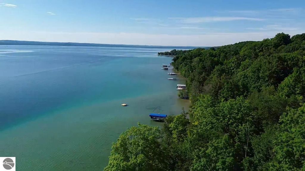 Image 31 of property listing at 7681 NW Torch Lake Drive, Kewadin, MI 49648