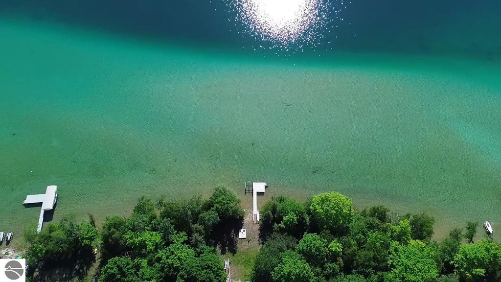 Image 32 of property listing at 7681 NW Torch Lake Drive, Kewadin, MI 49648