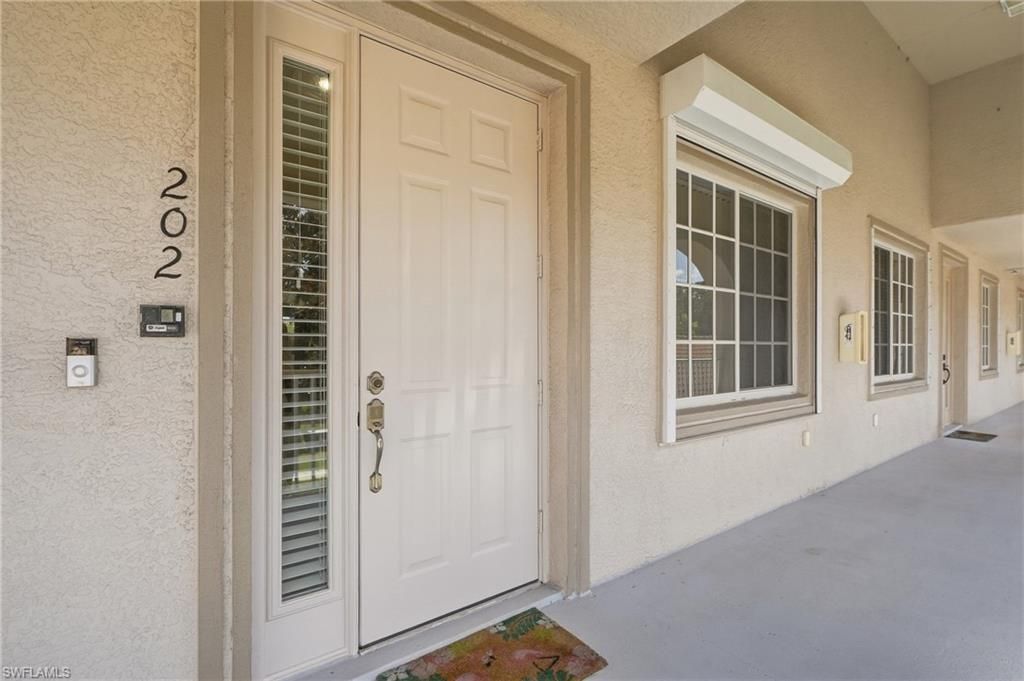 1112 Manor Lake DR 202, NAPLES, FL 34110 — photo 2