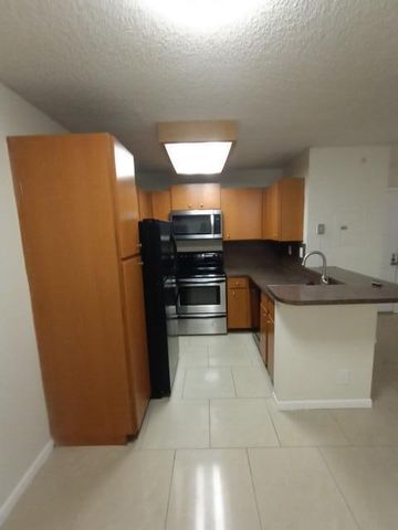 851 Lyons Road 22108, Coconut Creek, FL 33063