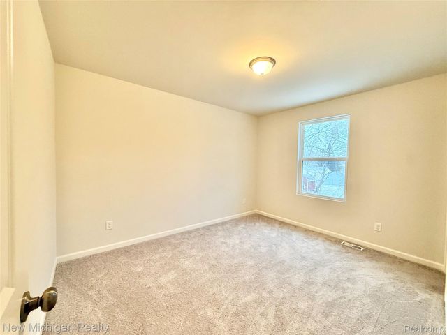 6079 Regency Drive, Burton, MI 48519