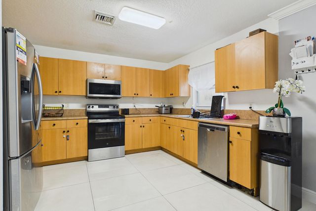 657 PERDIDO HEIGHTS Drive, Lake Belvedere Estates, West Palm Beach, FL 33413
