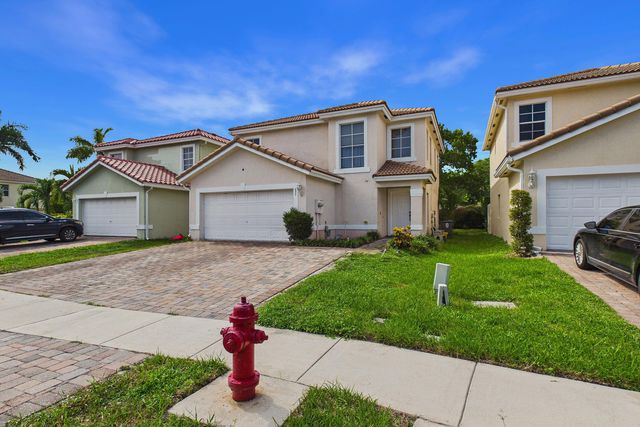 657 PERDIDO HEIGHTS Drive, Lake Belvedere Estates, West Palm Beach, FL 33413