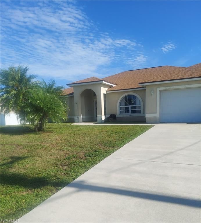 1713 NE 38th TER, CAPE CORAL, FL 33909 — exterior