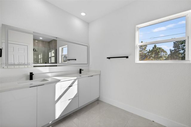 220 Lomax Ave, Lehigh Acres, FL 33974