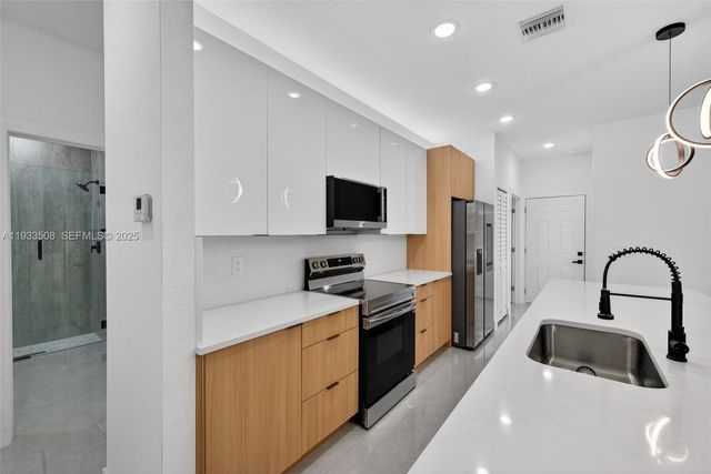 220 Lomax Ave, Lehigh Acres, FL 33974