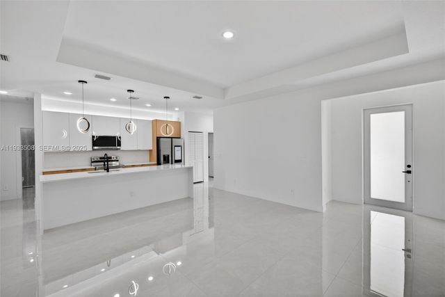 220 Lomax Ave, Lehigh Acres, FL 33974