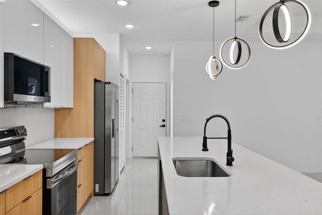 220 Lomax Ave, Lehigh Acres, FL 33974