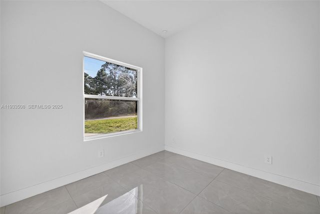 220 Lomax Ave, Lehigh Acres, FL 33974