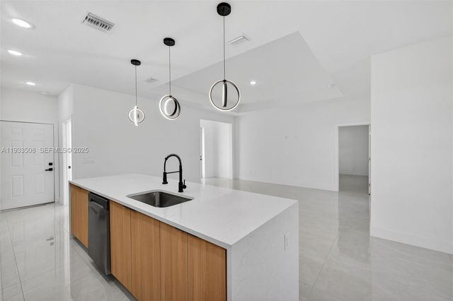 220 Lomax Ave, Lehigh Acres, FL 33974