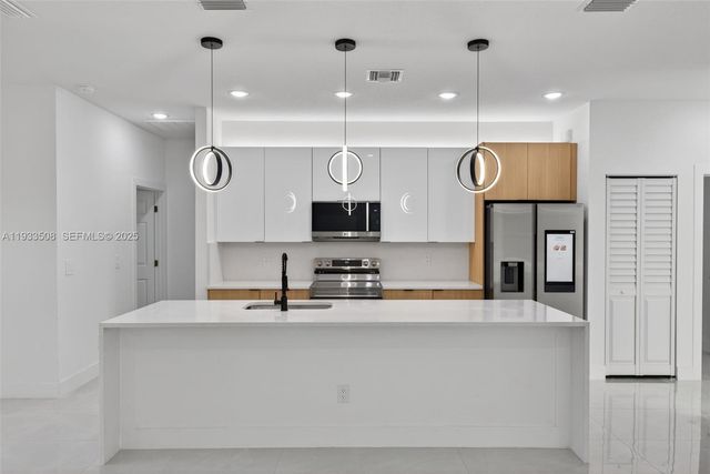 220 Lomax Ave, Lehigh Acres, FL 33974