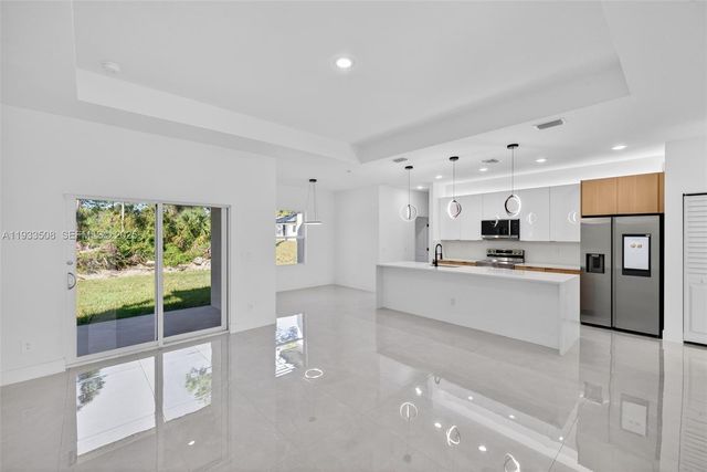 220 Lomax Ave, Lehigh Acres, FL 33974