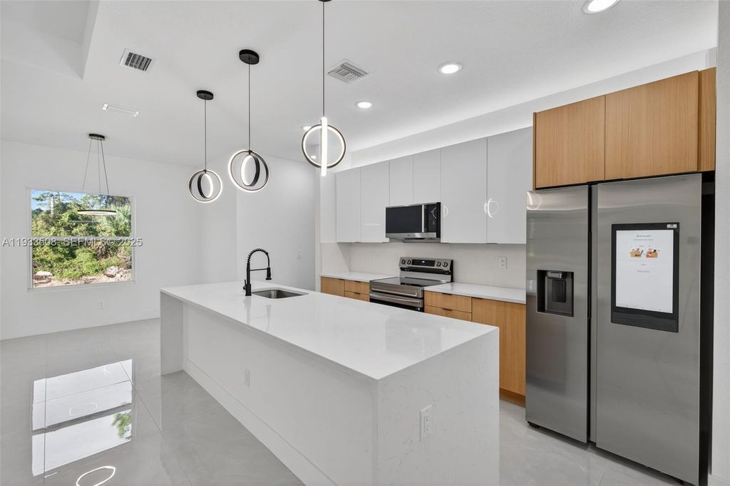 220 Lomax Ave, Lehigh Acres, FL 33974