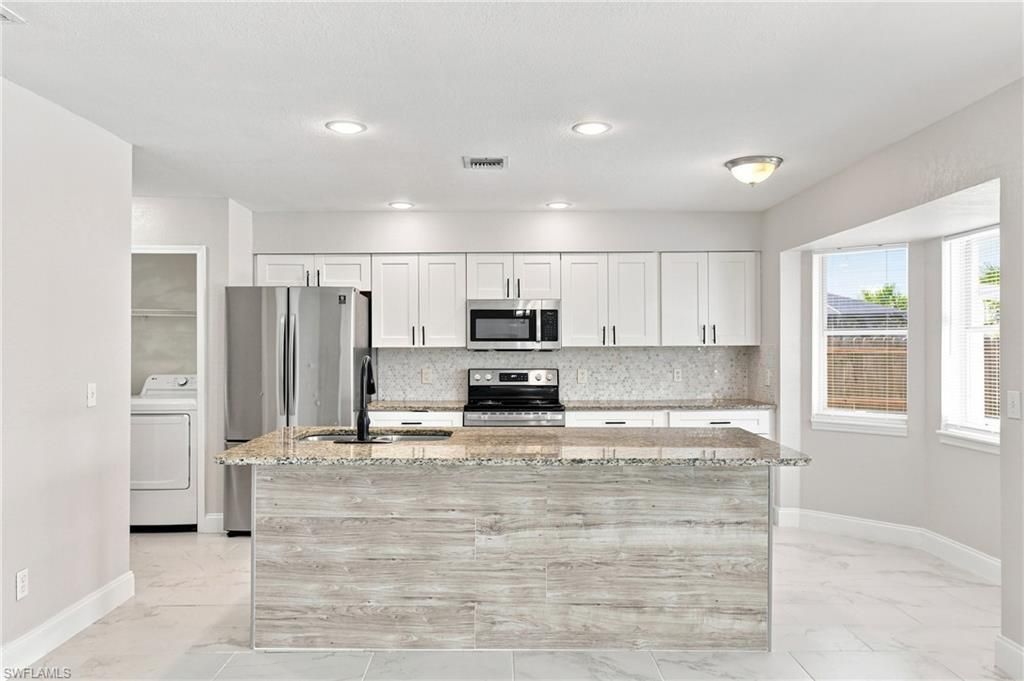 Image 10 of property listing at 1014 SW 15th AVE, Cape Coral, FL 33991