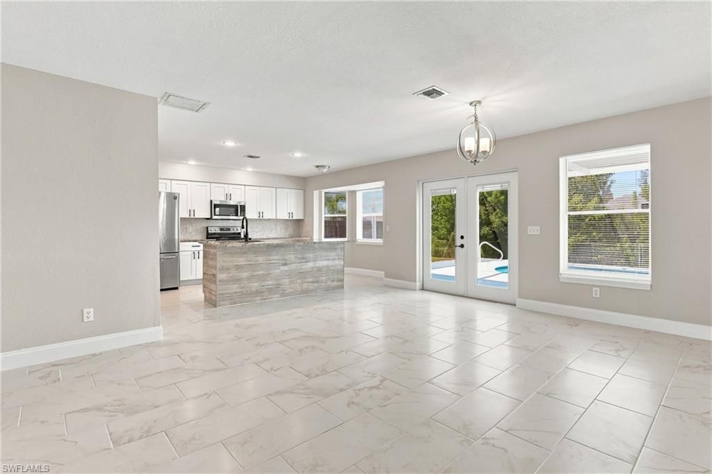 Image 6 of property listing at 1014 SW 15th AVE, Cape Coral, FL 33991