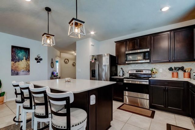 906 SWAYING SAWGRASS AVENUE, Ruskin, FL 33570