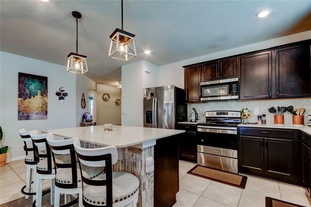 906 SWAYING SAWGRASS AVENUE, Ruskin, FL 33570