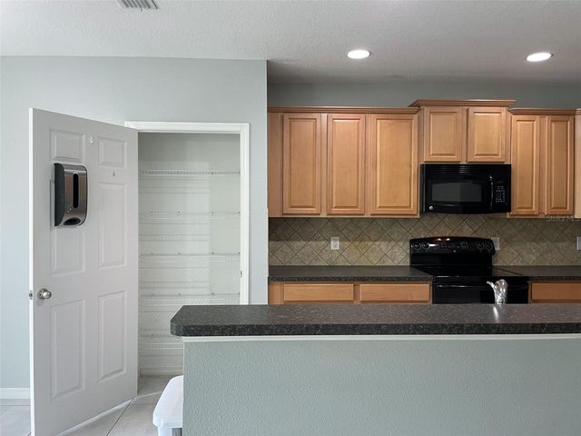 1418 MARSH MEADOW LANE, Davenport, FL 33896