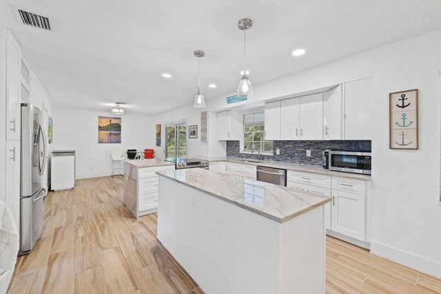 5554 Hibiscus Road, Jupiter, FL 33458