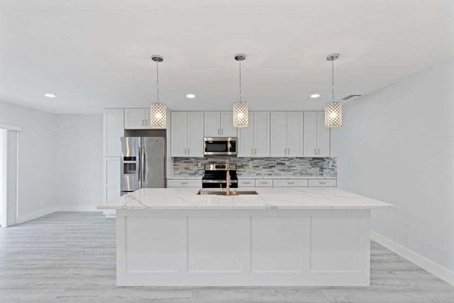 5036 Alfred Drive, West Palm Beach, FL 33417