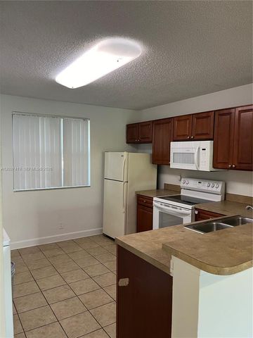 10131 W Sunrise Boulevard 106, Plantation, FL 33322