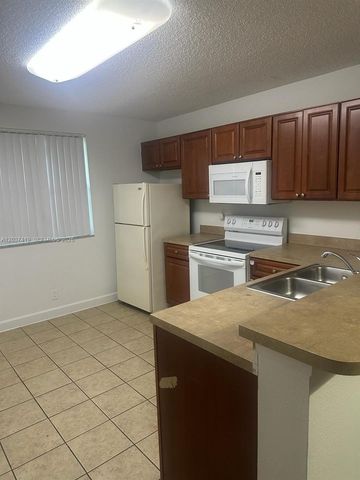 10131 W Sunrise Boulevard 106, Plantation, FL 33322