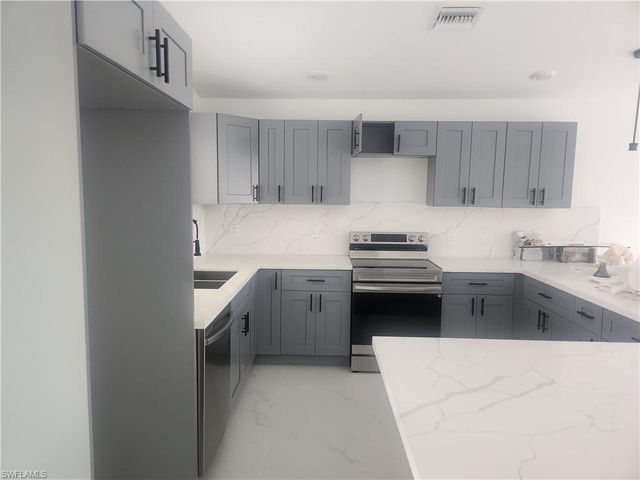 875 Cervantes ST E, Lehigh Acres, FL 33974