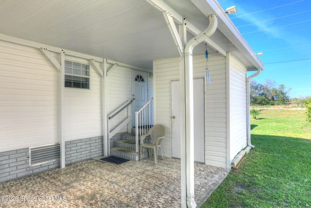 1055 Wren Circle, Barefoot Bay, FL 32976