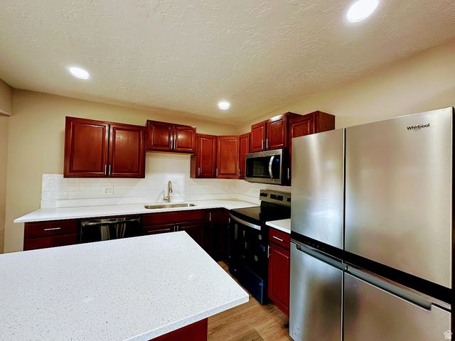 6092 S LONGMORE DR, Salt Lake City, UT 84118
