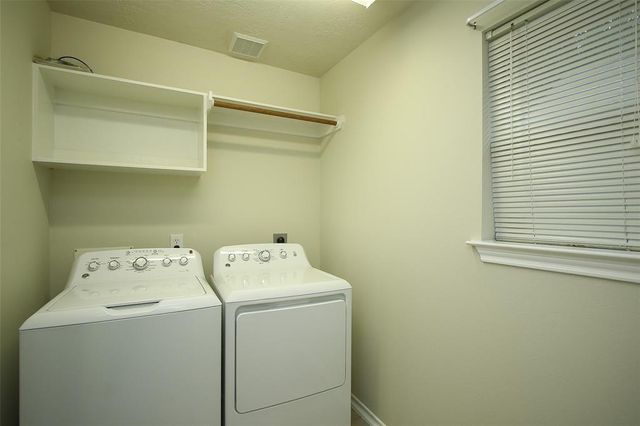 14 Delphinium Place, The Woodlands, TX 77382