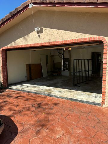 1700 NW 84th Drive, Coral Springs, FL 33071