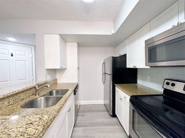 5124 CONROY ROAD 12, Orlando, FL 32811