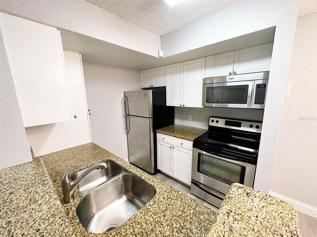 5124 CONROY ROAD 12, Orlando, FL 32811