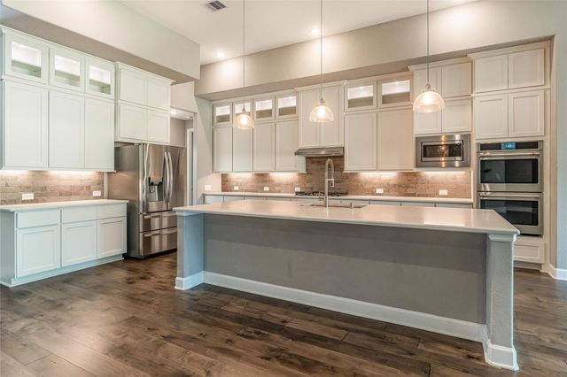 1050 Groveton Ridge Lane, Pinehurst, TX 77362