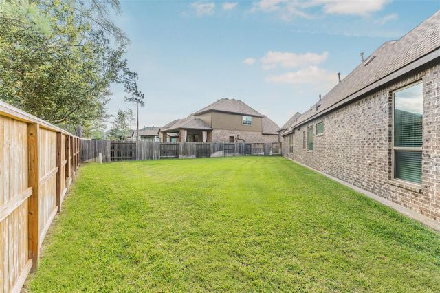 1050 Groveton Ridge Lane, Pinehurst, TX 77362