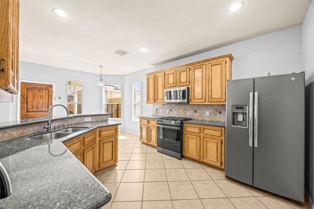 9526 Wakefield Village Drive, Houston, TX 77095