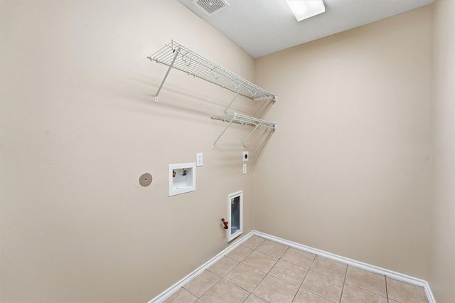 4706 Woodspring Glen Lane, Houston, TX 77345